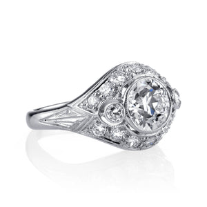 Platinum and Bezel set Diamond Ring